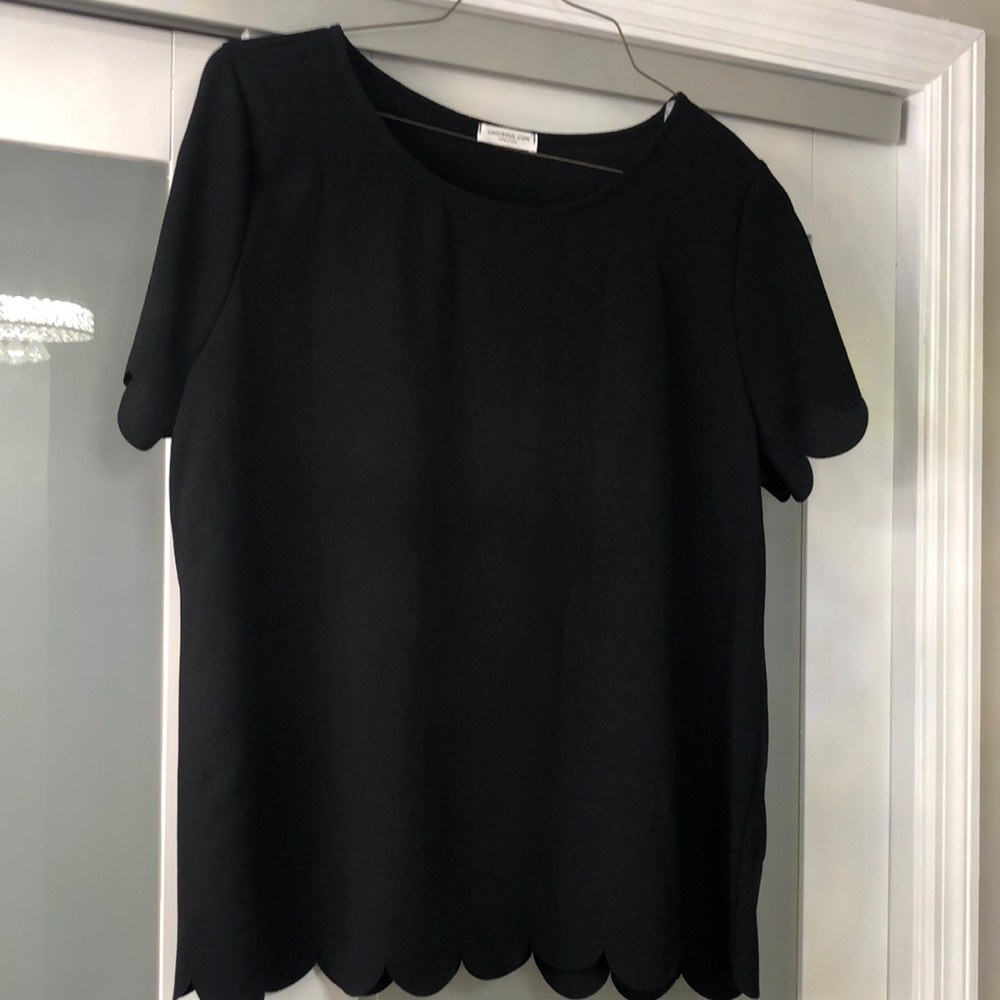 Black, scallop hem and sleeve detail. Never worn!